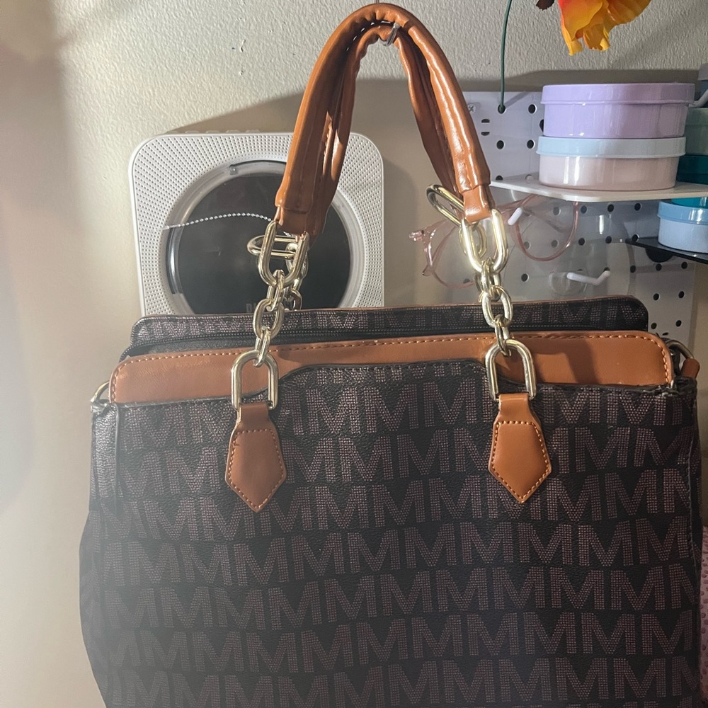 Two Damaged Bags                    Brown and Tan MK Handbag, and One Black Bag